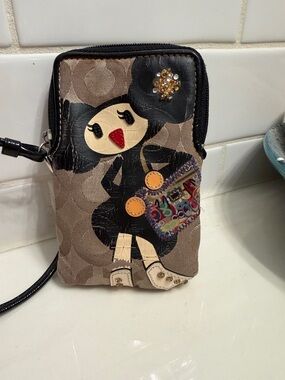 Coach Poppy Pepper Signature Wristlet with Girl Appliqué